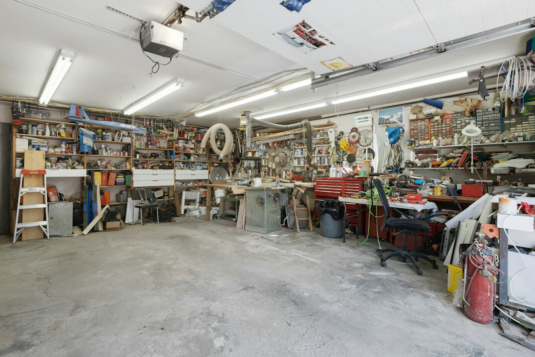 Organized garage with tools on the wall