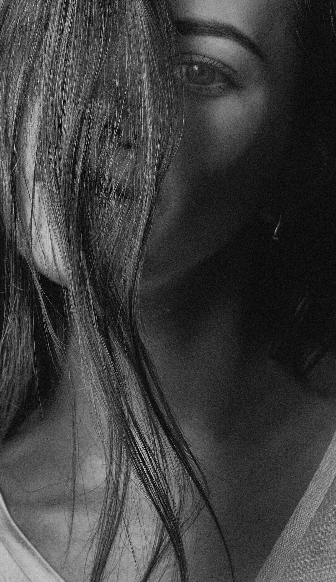 Portrait of a woman with long hair smiling
