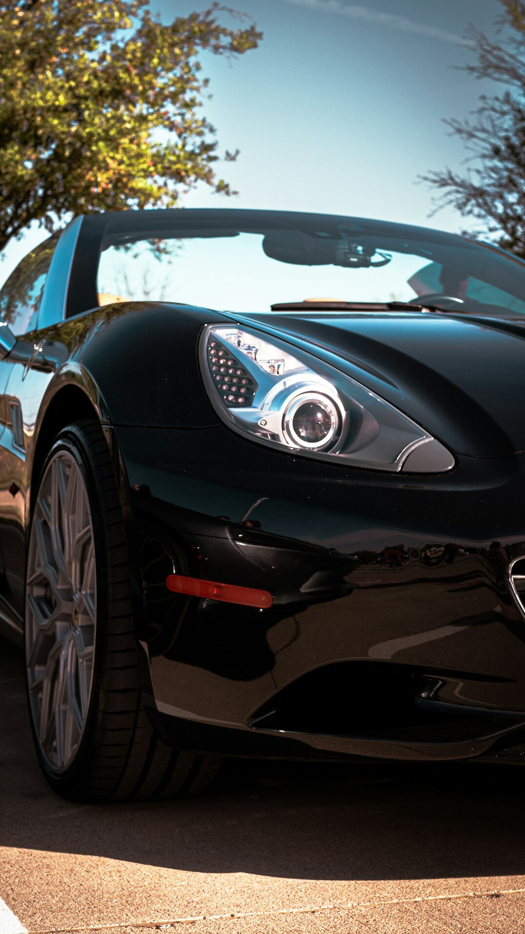 Sports car with a protective ceramic coating shining outdoors